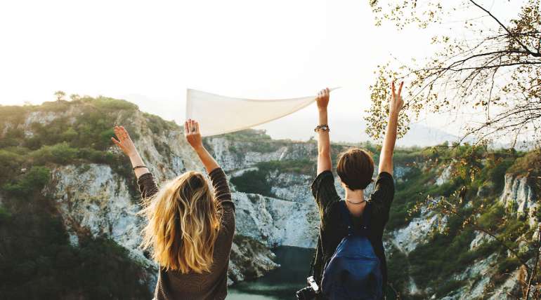 two friends having fun outdoors