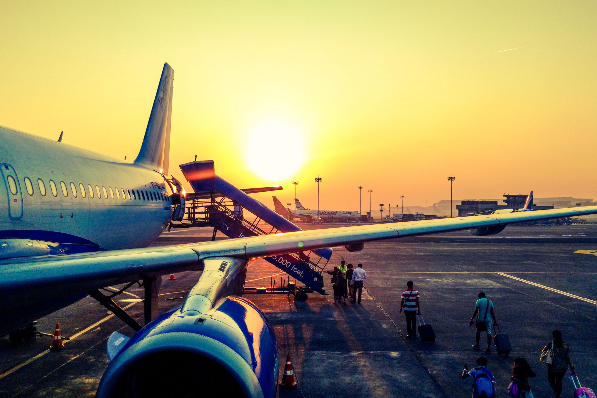 passengers boarding plane